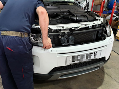 Range Rover Evoque has headlights re-fitted after adjustment Range Rover Evoque